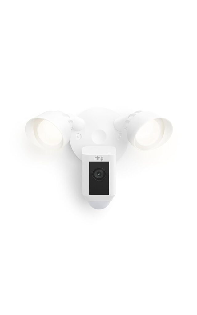 Ring Floodlight Cam Wired Plus mounted above a garage as part of a [best wired outdoor security camera system] setup
